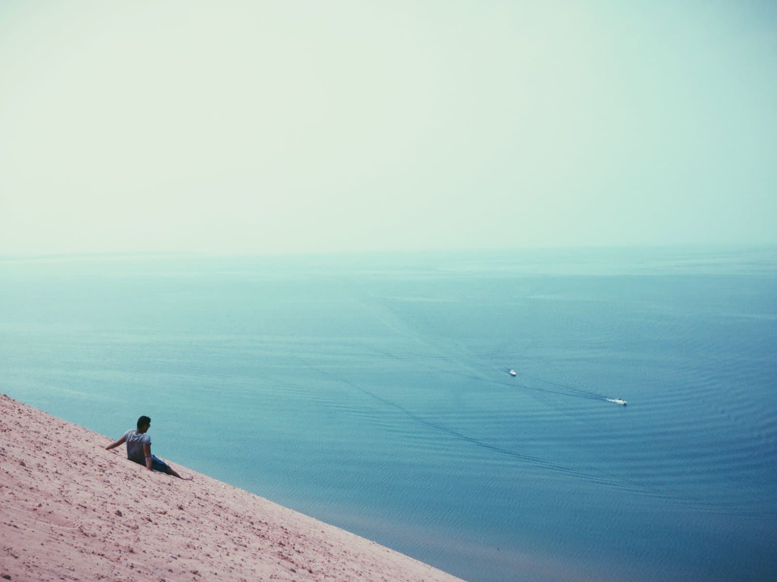 Photo by Snapwire: https://www.pexels.com/photo/beach-boats-ocean-sand-6963/